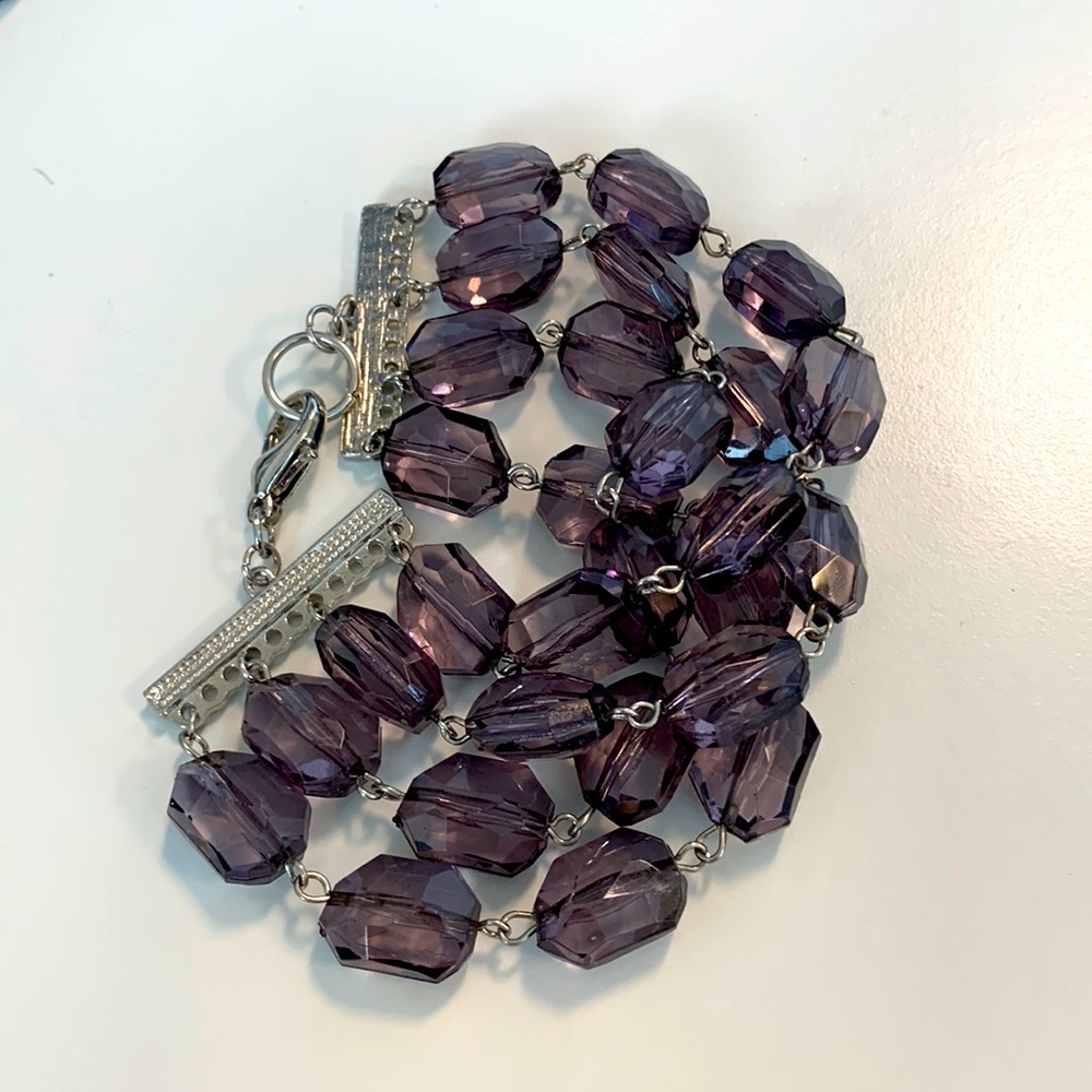 Multi-strand (4) Faceted Amethyst coloured oval bead bracelet 7"